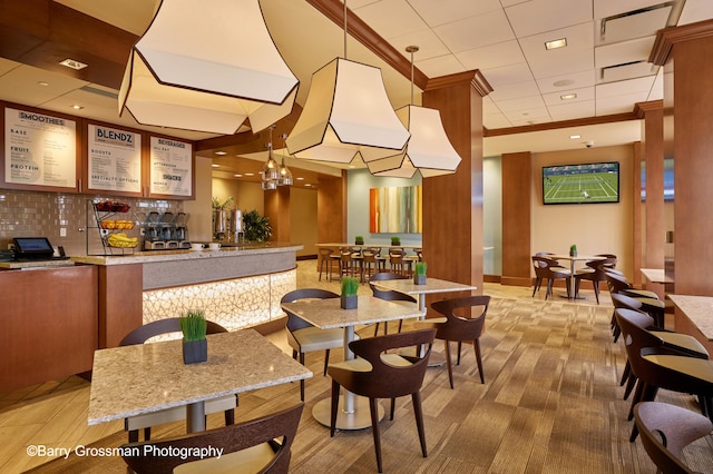 dining space with a chandelier