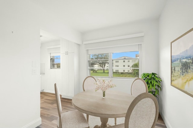 dining room featuring light wood-type flooring