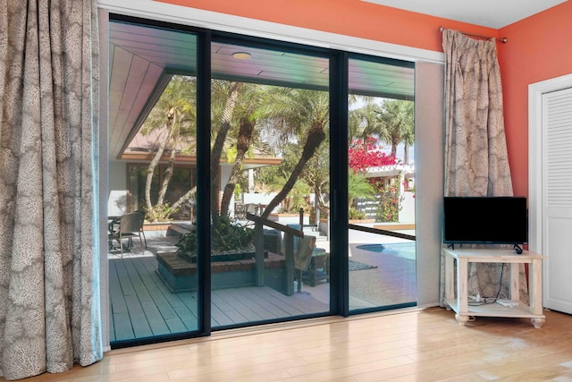 doorway to outside featuring light hardwood / wood-style floors