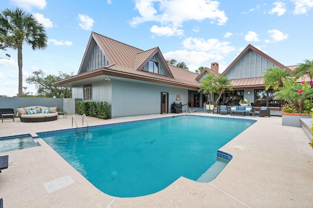 view of pool with an outdoor hangout area and a patio