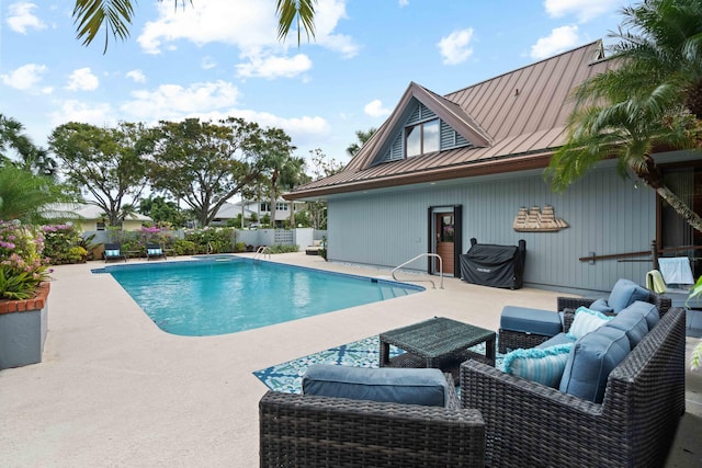 view of pool with an outdoor hangout area and a patio area