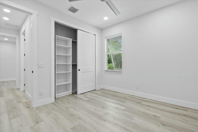 unfurnished bedroom featuring baseboards, recessed lighting, visible vents, and light wood-style floors