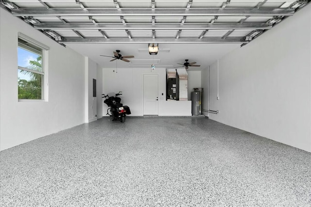 garage with a garage door opener, water heater, ceiling fan, and heating unit