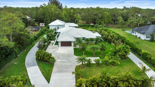 bird's eye view featuring a view of trees