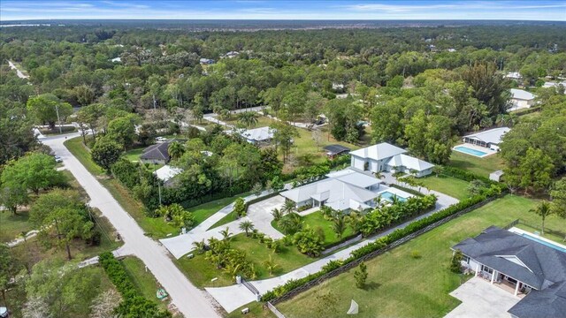 aerial view featuring a view of trees