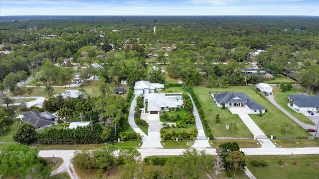 bird's eye view featuring a forest view