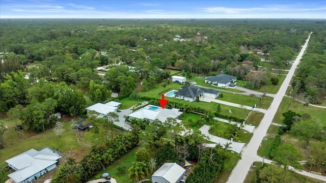 aerial view featuring a forest view