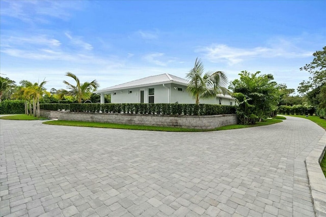 view of home's exterior with stucco siding