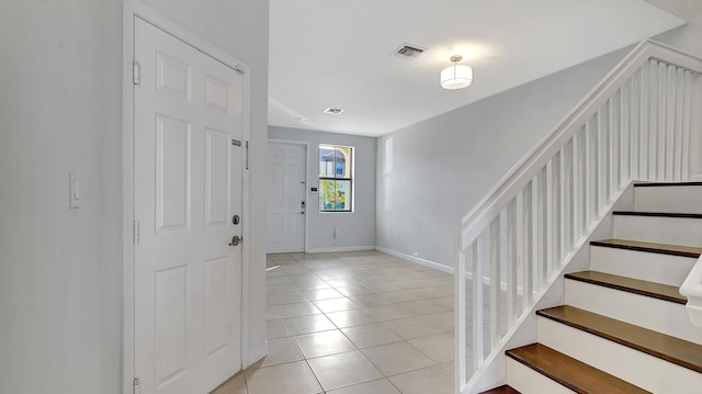 view of tiled foyer entrance