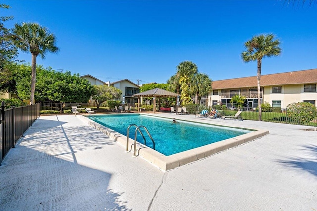 view of swimming pool featuring a patio area