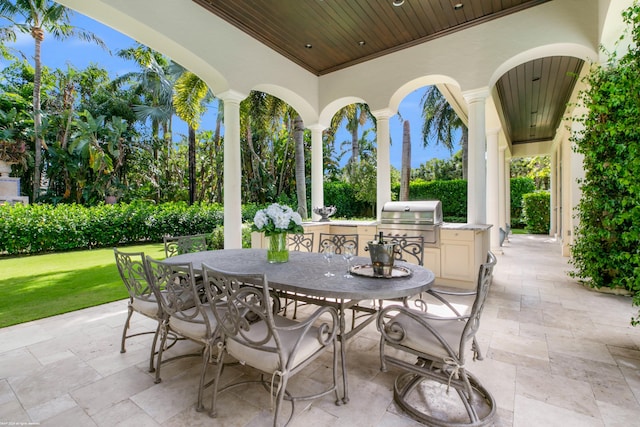 view of patio featuring a grill and exterior kitchen