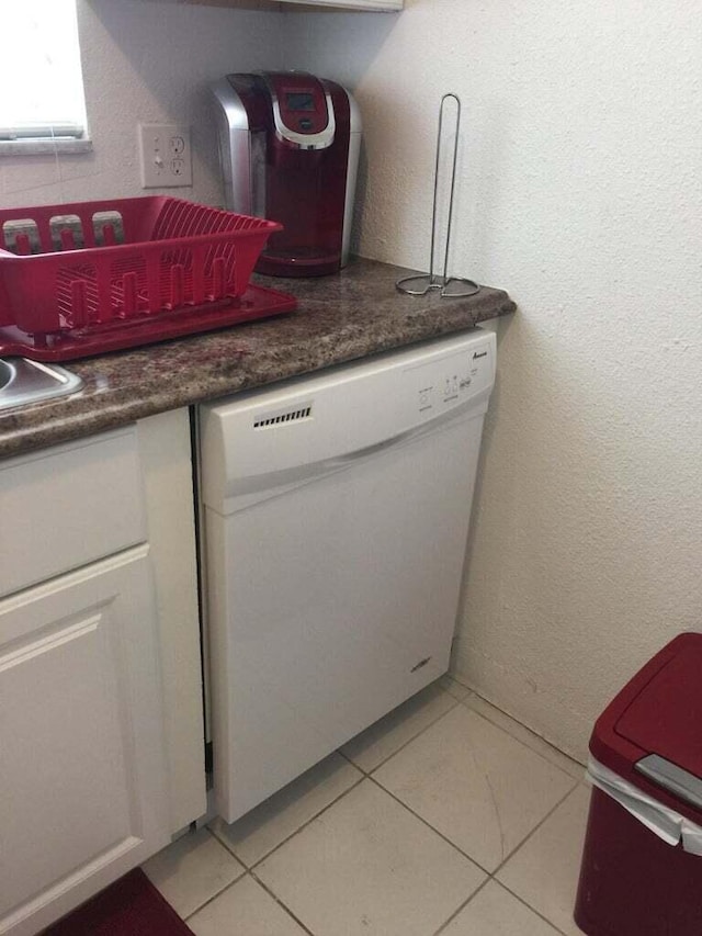 details featuring dishwasher and white cabinetry