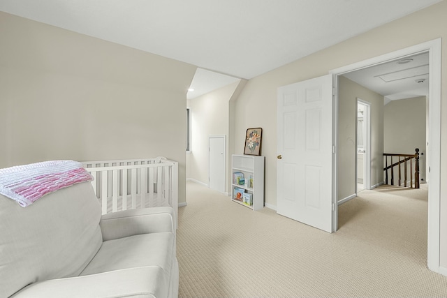 bedroom with light colored carpet