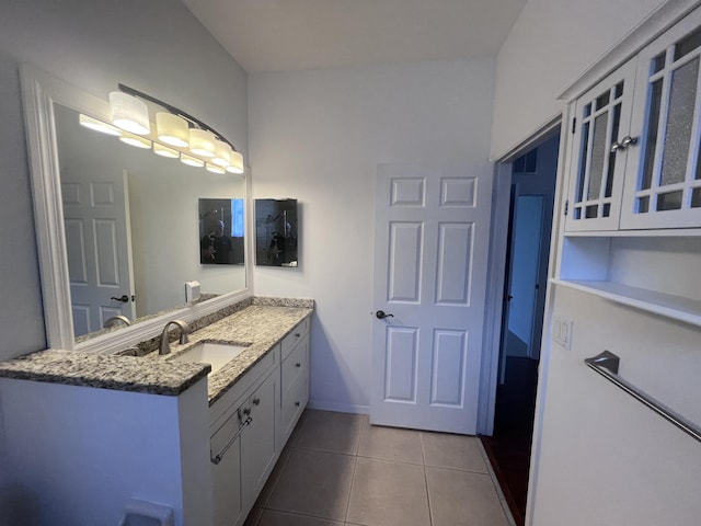 bathroom featuring tile patterned floors and vanity