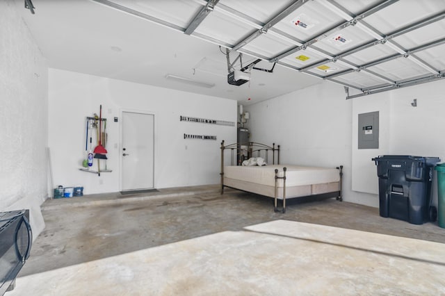 garage with a garage door opener, electric panel, and water heater