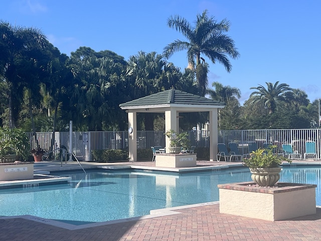 view of pool with a gazebo and a patio area