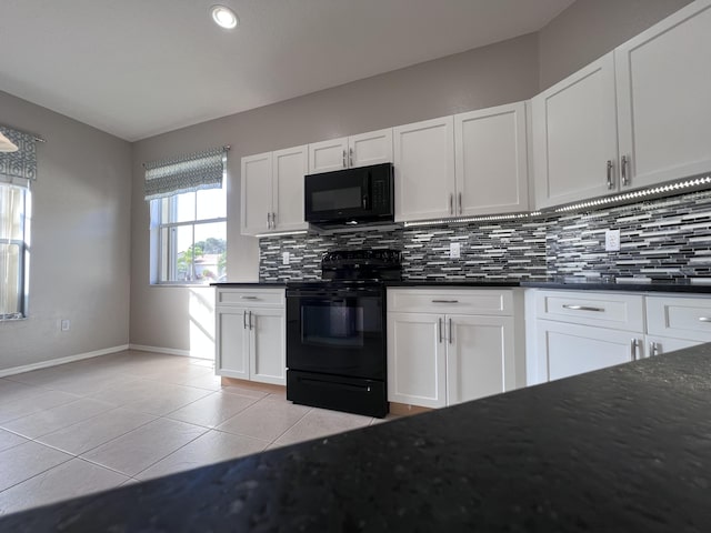 kitchen with black appliances, light tile patterned flooring, white cabinetry, and tasteful backsplash