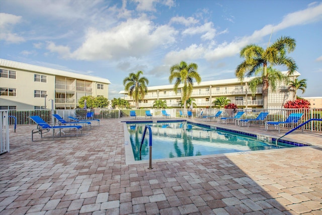 view of swimming pool featuring a patio