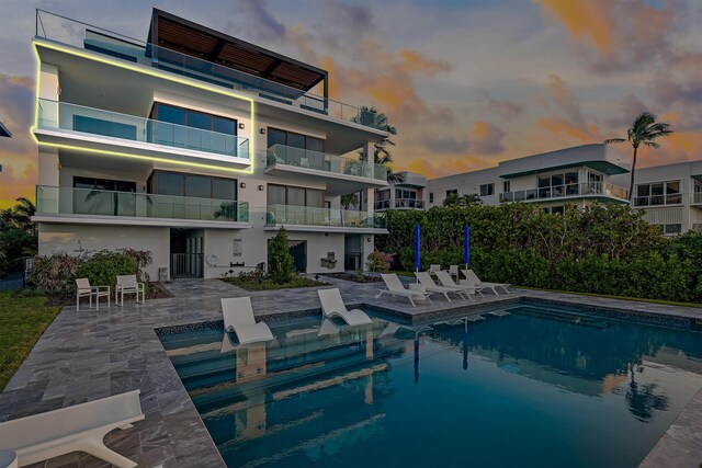 outdoor pool with a patio