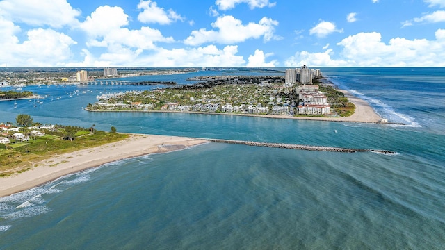 drone / aerial view with a view of the beach and a water view