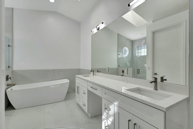 bathroom with vanity, plus walk in shower, and vaulted ceiling