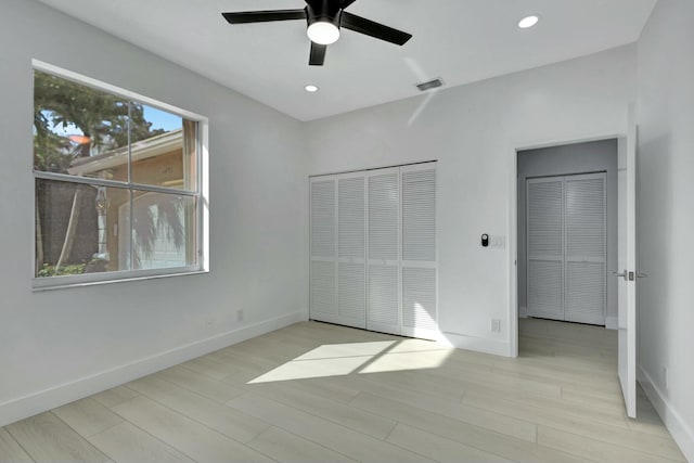 unfurnished bedroom with ceiling fan