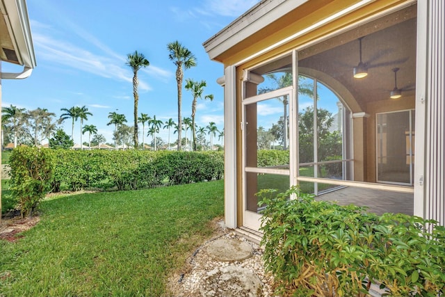 view of yard with a sunroom