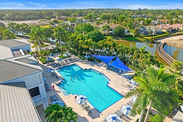 view of pool featuring a water view