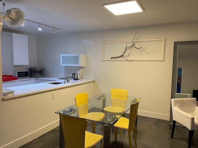 dining area with sink