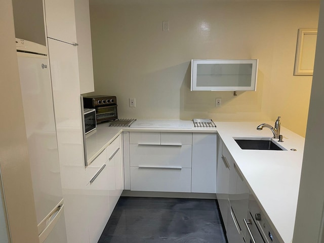 kitchen with white cabinets and sink