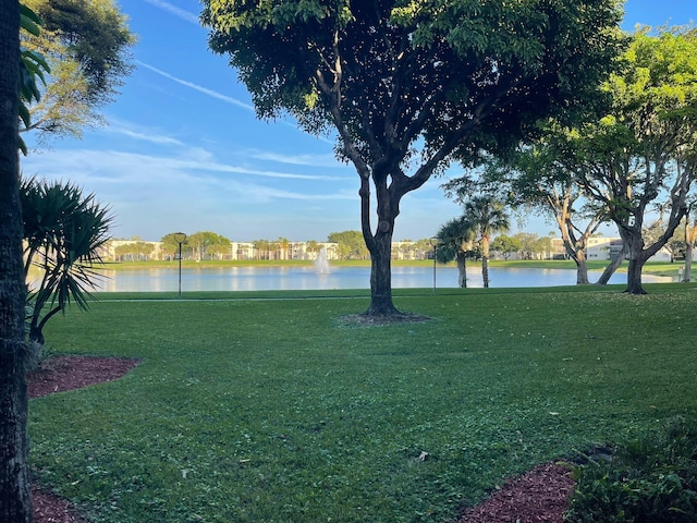 view of yard with a water view