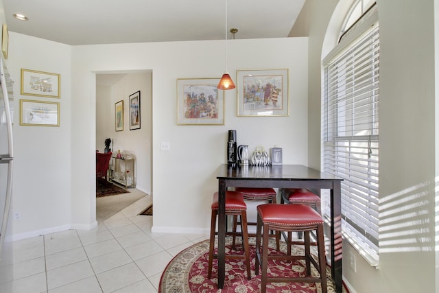 view of tiled dining space