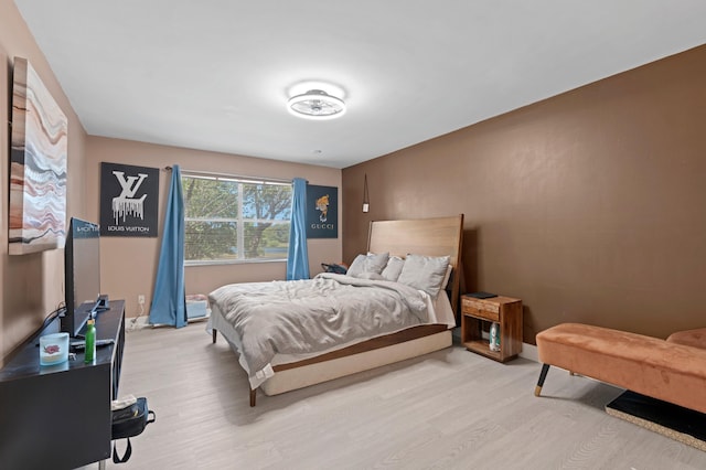 bedroom featuring light wood-type flooring