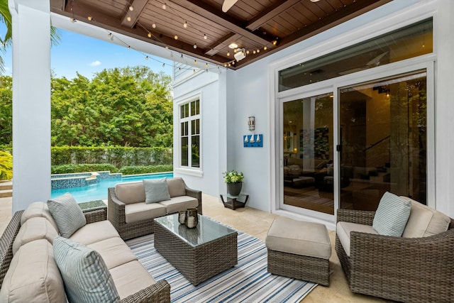 view of patio with ceiling fan and an outdoor hangout area