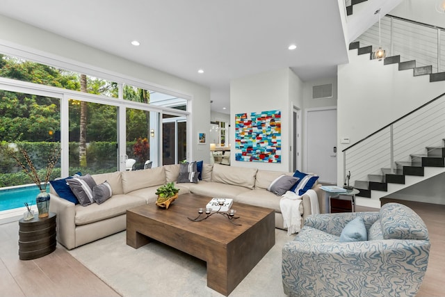 living room with light hardwood / wood-style floors