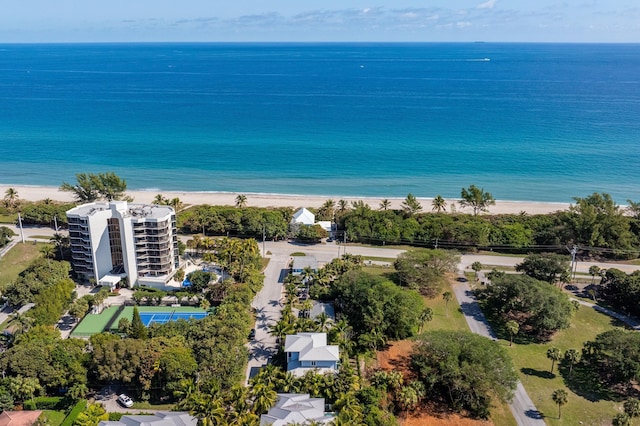 aerial view with a water view and a view of the beach