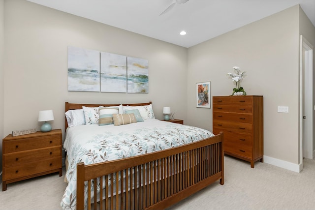 bedroom featuring ceiling fan and light colored carpet