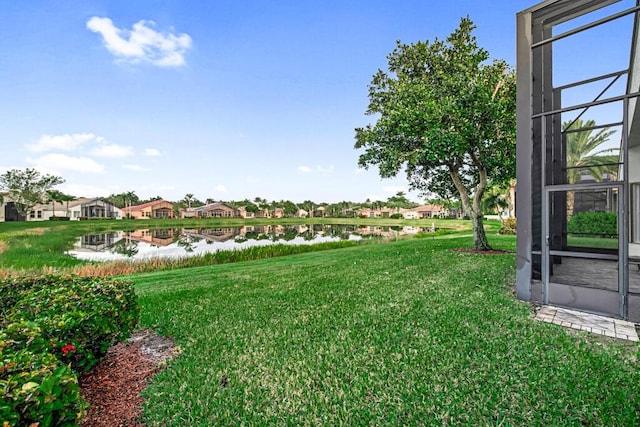 view of yard featuring a water view