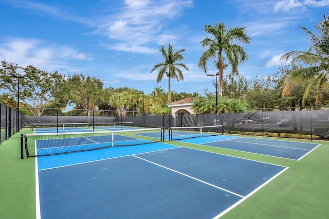 view of sport court with basketball hoop