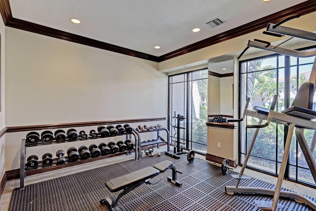 gym with a textured ceiling