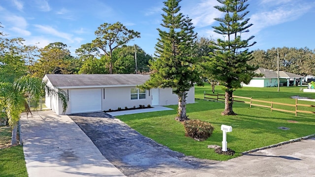 ranch-style home with a front yard