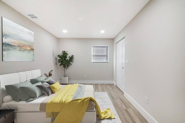 bedroom featuring light hardwood / wood-style flooring