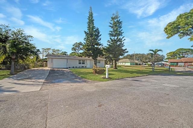 ranch-style house with a front yard