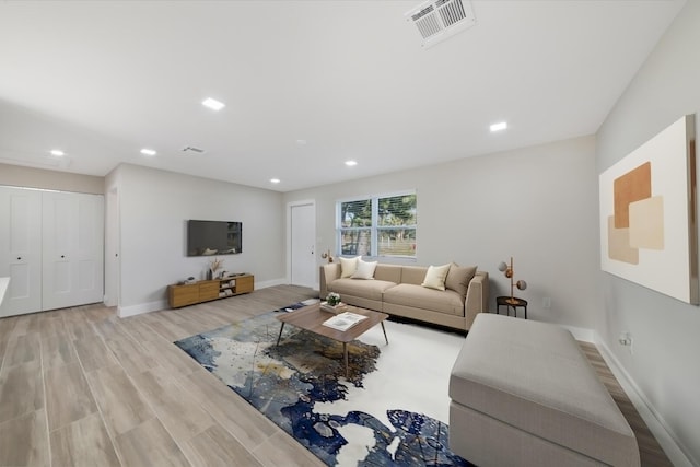 living room featuring light hardwood / wood-style floors