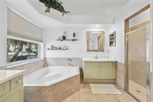 bathroom with separate shower and tub, tile patterned floors, and vanity