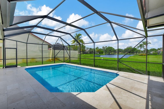 view of swimming pool with a lanai, a patio area, a yard, and a water view