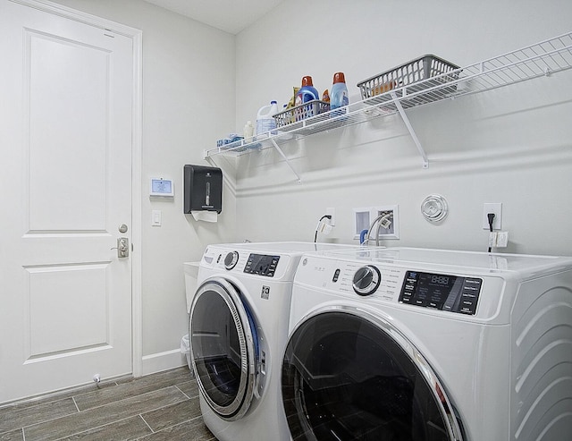 laundry area featuring washing machine and dryer