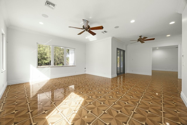 unfurnished room featuring crown molding and ceiling fan