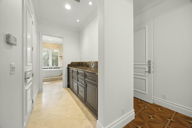 bathroom featuring vanity and crown molding