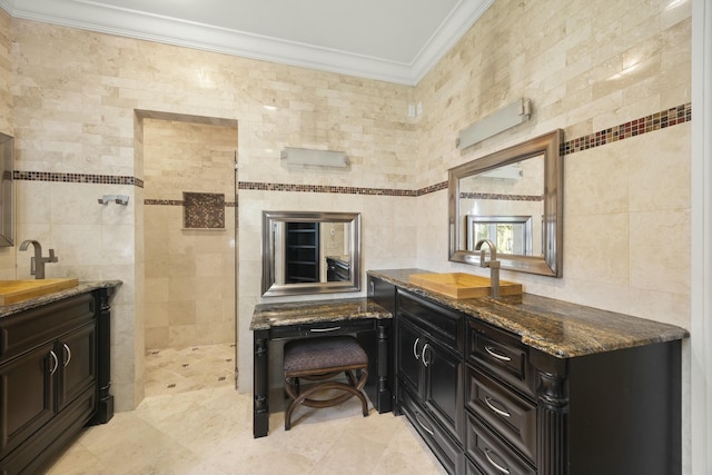 bathroom with vanity, tile walls, and crown molding